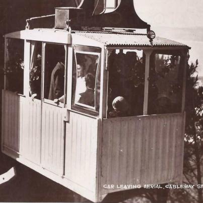 Car leaving aerial cable way station